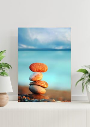 póster piedras zen en la playa